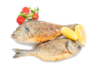 Fried dorado with lemon, tomatoes and basil on white background