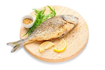 Wooden board with fried dorado on white background