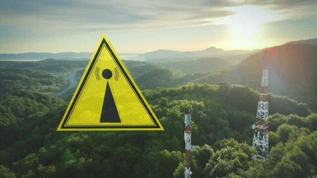 Warning Symbol sign and radio towers, up in the mountains - 3D render animation