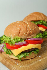 Concept of tasty food with delicious burgers