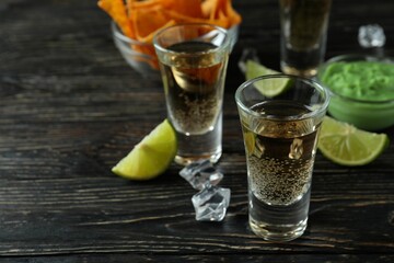 Party concept with tequila, guacamole and chips