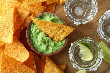 Party concept with tequila, guacamole and chips