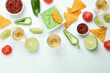Party concept with tequila, guacamole and chips