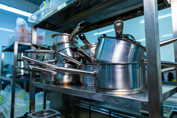 Big industry kitchen equipment. Stainless cooking commercial equipment.