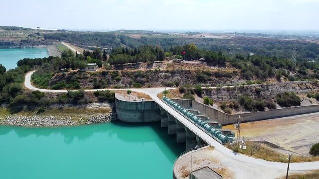 Aerial view of water reservoir and closed reservoir locks of a dam. Berdan dam, Tarsus, Mersin province, Turkey