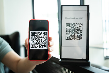 Qr code payment. E wallet. Man scanning tag accepted generate digital pay without money.scanning QR...