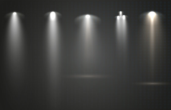 Spotlights set isolated on transparent background. Vector glowing light effect with golden rays and lens flares.	