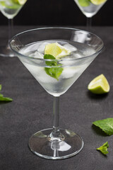 Misted wine glass with lime, mint and ice