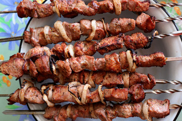 Kebabs on skewers prepared on charcoal grill, grilled meat, grilled food, shashlik