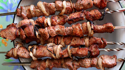 Kebabs on skewers prepared on charcoal grill, grilled meat, grilled food, shashlik