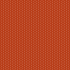 Vector seamless polka dot pattern on a red background