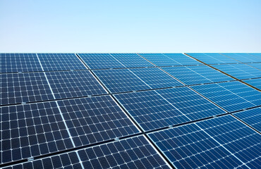 Picture of solar panel modules on a sunny day, selective focus.
