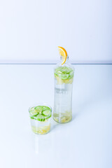 Glass of Water Sassy with lemon, cucumber and ginger, selective focus