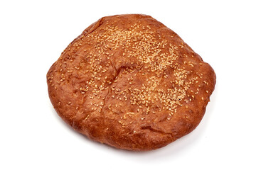 Traditional round rye bread, isolated on white background.
