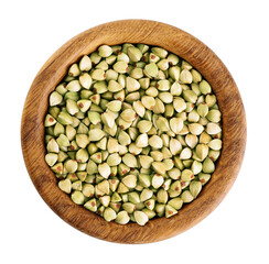 Green buckwheat in a wooden bowl isolated on white background. With clipping path.