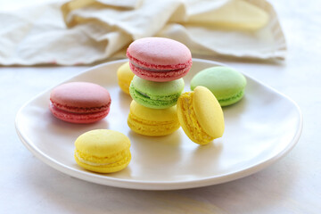 multicolored macaroon cakes. red, green, yellow macaroons. Close-up macaron