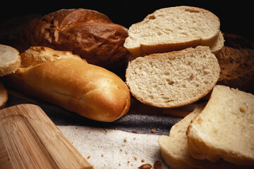 Cut bread assortment for a background, close up