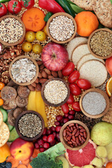 Healthy food collection high in dietary fibre for gut health with foods also high in antioxidants, minerals, vitamins, anthocyanins, omega 3, protein & lycopene.  Healthcare concept. Flat lay.