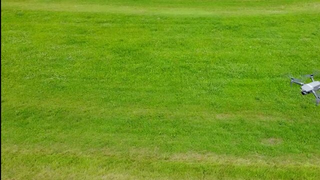 Flying around a drone and its remote pilots