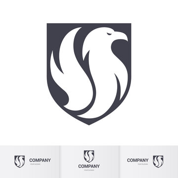Creative White Eagle Logo Inside Shield. Concept Inspiration Template. Modern Professional Hawk Logo Design. Phenix Head Logo Illustration
