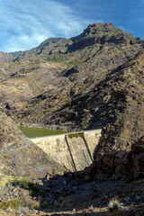 Dam and reservoir at the mountain road Barranco de la Aldea in Gran Canaria