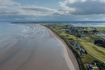 Aerial view over Donabate beach and Irish coastline landscape.
