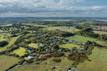 Obraz premium Aerial view over Irish coastal village and farms in Donabate, Dublin County, Ireland,