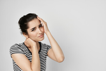 woman holding her head medicine treatment stress headache