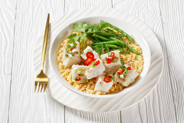 cod with bulgur, steamed green beans, top view