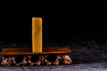 On a black background, Chinese stone reliefs, traditional Chinese handicrafts