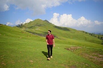 person walking in the mountains