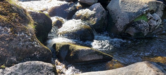 River fowing over large stones