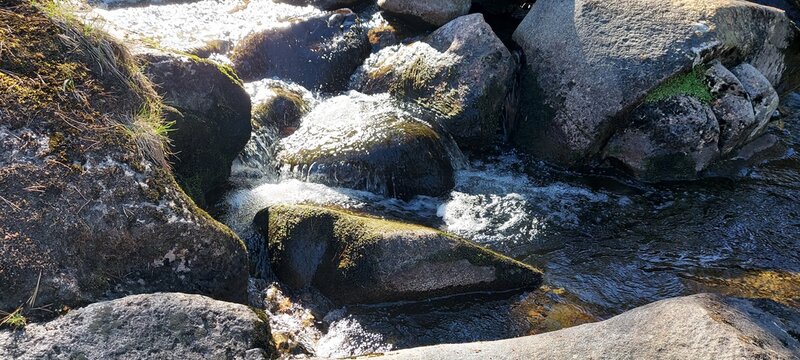 River fowing over large stones