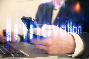 Multi exposure of man's hand holding and using a digital device and data theme drawing. Innovation concept.