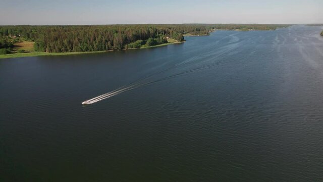 Daycruiser motorboat at high speed in Stockholm archipelago, Sweden, aerial