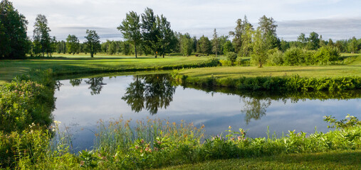 Nice hole on a Canadian golf club in Quebec, on the countryside