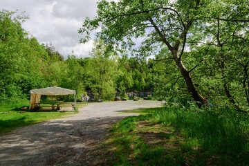  Sitting by an old flooded quarry. Bathing. The village of Vykleky. Central Moravia. Europe. 