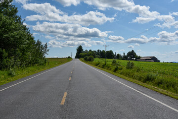 Fototapeta premium Countryside landscape with farm in Quebec, Canada
