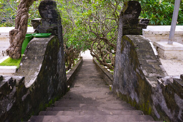 Ancient stone stairway at Uluwatu temple in Bali, Indonesia. No people.