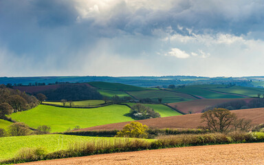 Dramatic clouds and sky over fields of Berry Pomeroy, Devon, England, Europe