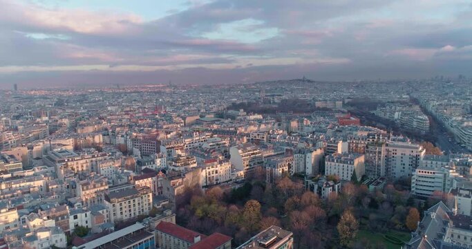 An Aerial view of the city of Paris waking up to a winter morning with a beautful colorfull sky