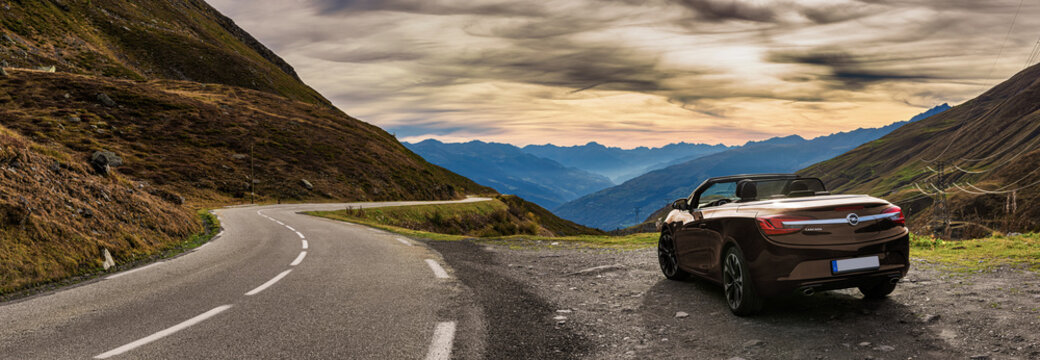 Opel Cascada 2015 at the summit of a pass in switzerland