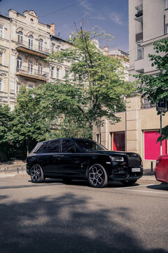 Black luxury SUV Rolls-Royce Cullinan on the street. Kyiv, Ukraine - June 2021.