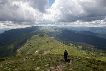 Fototapeta premium mountain peaks and clouds above them