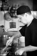 Chef cooking in the kitchen