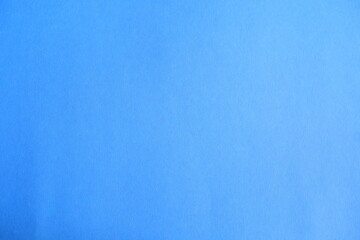  Blue background. The texture of the cardboard.