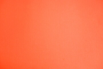 Orange background. The texture of the cardboard.