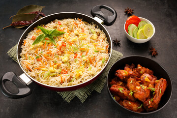 Chinese fried rice and chilly chicken curry Chicken fried rice with vegetables fried eggs basmati grain very popular food in restaurants Kerala Mumbai India Sri Lanka china - obrazy, fototapety, plakaty