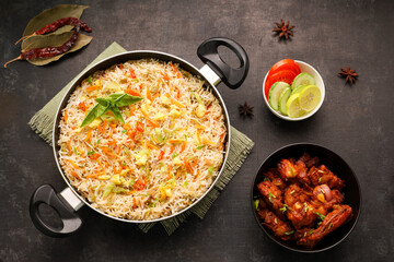 Chinese fried rice and chilly chicken curry Chicken fried rice with vegetables fried eggs basmati grain very popular food in restaurants Kerala Mumbai India Sri Lanka china