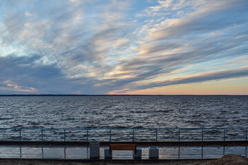 Fototapeta na wymiar beautiful sunset and waves on the Volga River